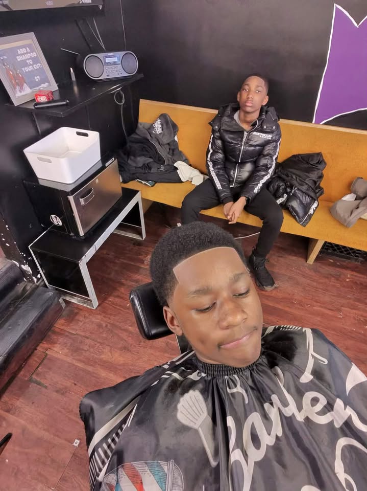 Clients waiting for a cut at ZINGCUTZ barbershop
